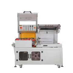 FULLY AUTOMATIC SHRINKING PACKAGING MACHINE