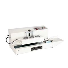INDUCTION SEALING MACHINE