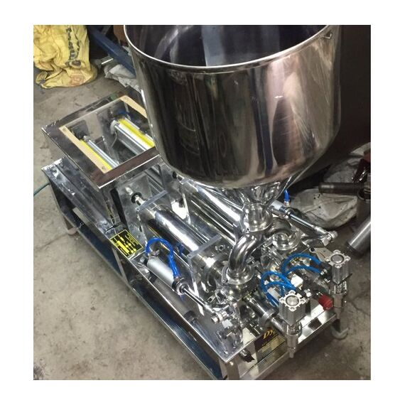 DOUBLE HEAD LIQUID FILLING MACHINE WITH 100-1000 ML CAPACITY